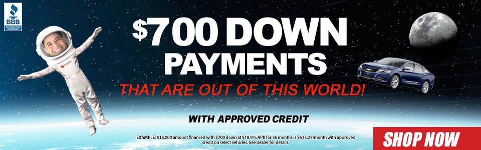 Astronaught in space talking about low prices with 700 down. Down payments starting at $700. Shop now.
