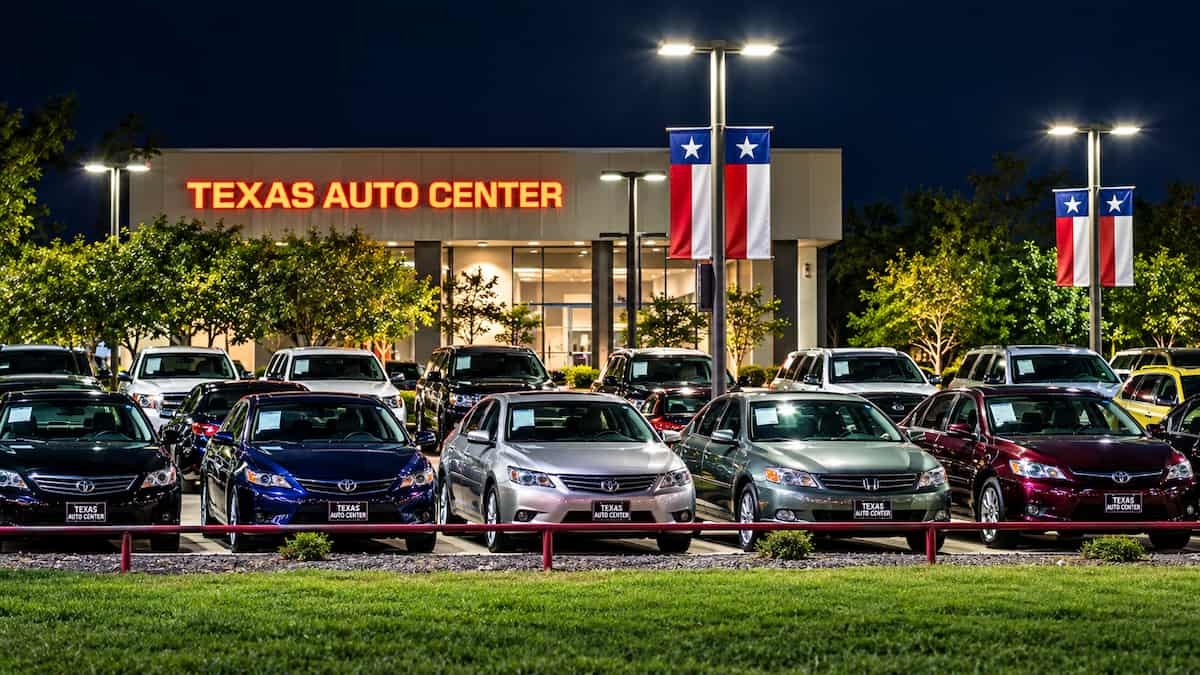 Customer shopping for affordable used cars at a used car dealership in Austin, TX, serving Austin and San Marcos drivers.